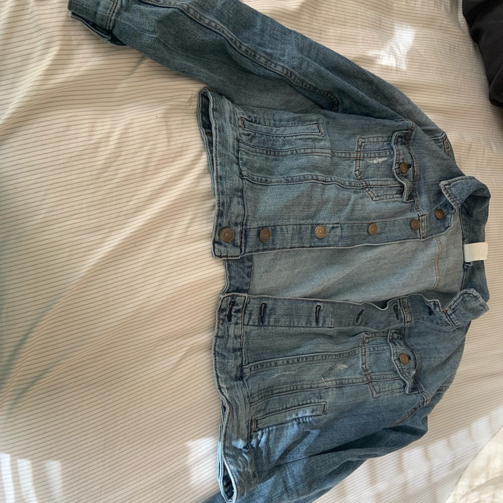 Distressed jean jacket